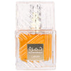 Perfume bottle with orange liquid and 'Khamrah' branding on a white background