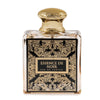 Perfume bottle labeled 'Essence de Noir' with gold and black design on a white background
