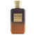 Perfume bottle labeled 'Island Vanilla Dunes Khadlaj' with textured design on a white background