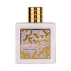 Perfume bottle with gold cap and intricate design on a white background